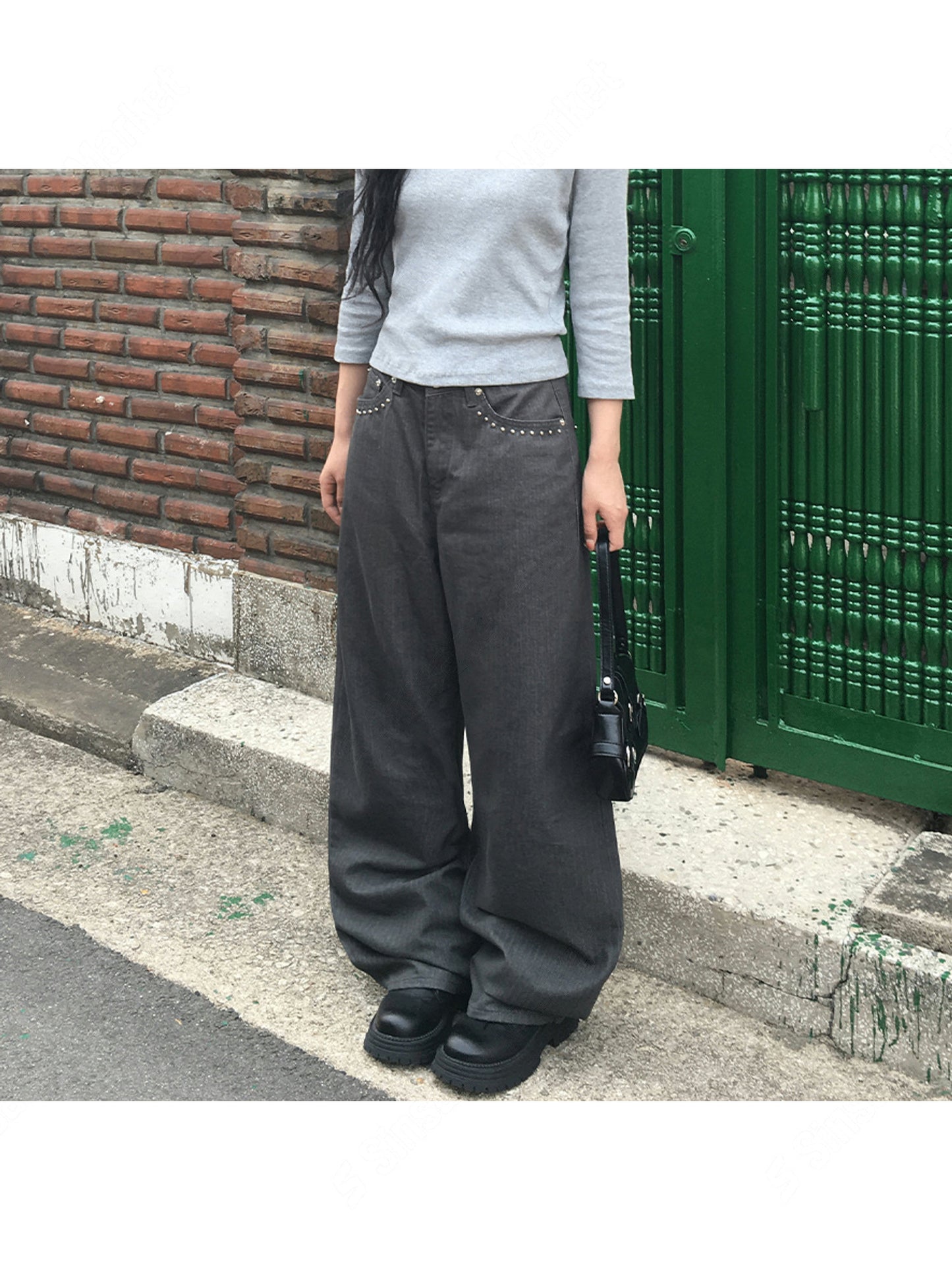 小鉚釘口袋洗水牛仔褲