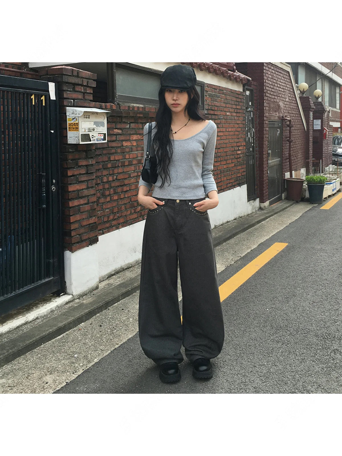 小鉚釘口袋洗水牛仔褲