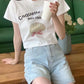 Coquette shell ribbon crop tee