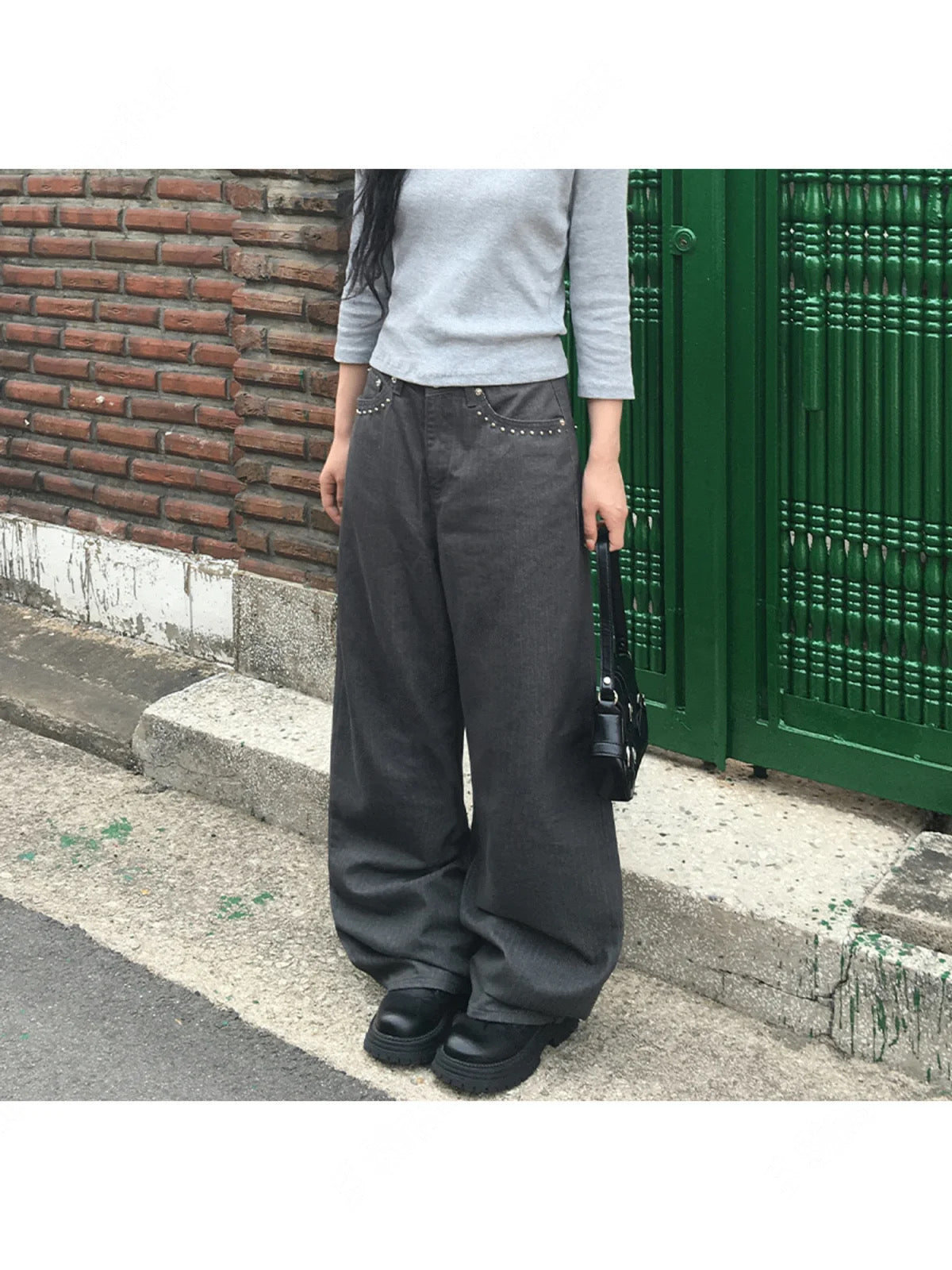 小鉚釘口袋洗水牛仔褲