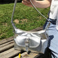 Buckle pocket shoulder-bag